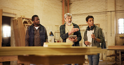 Buy stock photo Workshop, men and group with tablet, carpenter or discussion with research, woodworking or technique. People, mature mentor and review of info on tech, trainee or collaboration for furniture business