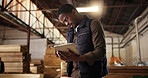 Carpentry, workshop and business black man on tablet for online planning, checklist and inventory. Woodworking, factory and carpenter on digital tech for manufacturing, furniture or timber production