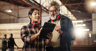 Buy stock photo Carpenter, mature man and woman with tablet, teamwork and intern with research for woodworking technique. Online, mentor and review of info on tech, trainee and collaboration for furniture business