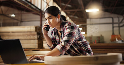 Buy stock photo Phone call, carpentry and woman in workshop talking for furniture, manufacturing and lumber renovation. Computer, factory and carpenter on smartphone for online orders, inventory and timber stock