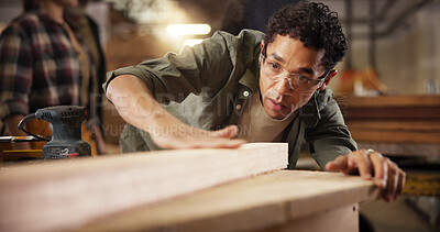 Buy stock photo Man, carpenter or wood with smooth finish on workbench for polish, craft or timber project. Male person, woodworker or safety glasses with wooden repair or lumber restoration at workshop or warehouse