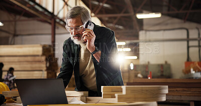 Buy stock photo Phone call, laptop and man in carpentry workshop for furniture, manufacturing and lumber renovation. Construction, factory and carpenter on smartphone for online orders, inventory and timber stock
