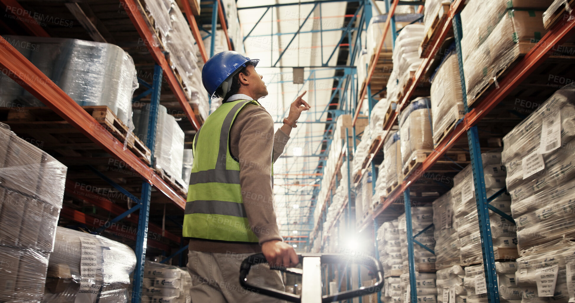 Buy stock photo Man, count or trolley in warehouse with boxes, loading bay or inventory management in logistics. Worker, search or packaging in storage for export, backlog control or low angle of parcel inspection