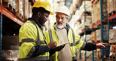 Buy stock photo Warehouse, logistics and businessmen with tablet for teamwork, stock inventory and inspection. Technology, employees and mature supervisor with pointing for checklist, supply chain and distribution