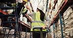 Team, smile and fist bump in warehouse for logistics, loading bay or greeting with trolley. Worker man, woman back or  hand gesture at packaging for approval, good job or work friends in supply chain