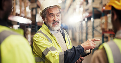 Buy stock photo Logistics, mature man and discussion with tablet, warehouse and quality assurance on website and group. Factory, collaboration and team with tech for supply chain, conversation and business people