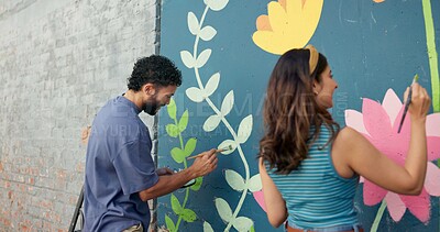 Buy stock photo Smile, creative and couple painting on wall for art project, mural design and renovation of community. Happy, people and artist hobby for improvement, diy decoration and makeover for flower aesthetic