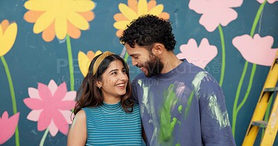 Buy stock photo Mural, art and couple love by wall for creative project, painting and decoration outdoors. Renovation, hug and happy man and woman with inspiration for flowers, aesthetic and DIY design together