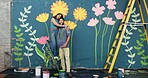 Painting, ladder and portrait of couple by wall for art project, creative design and decoration outdoors. Happy, smile and man and woman hug with inspiration for flowers, aesthetic and diy renovation