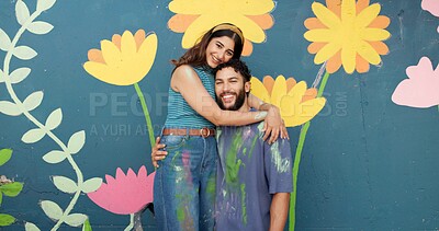 Buy stock photo Hug, wall and portrait of couple for painting, creative project and decoration outdoors. Happy, smile and man and woman with inspiration for flowers, spring aesthetic and DIY art for community centre