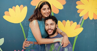Buy stock photo Happy, portrait and couple by wall for painting, creative project and decoration outdoors. Art, smile and man and woman hug with inspiration for flower mural, aesthetic and DIY design together