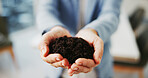 Office, sustainable and hands with soil, person and employee with new ideas for financial growth. Eco friendly, opportunity and closeup of palm in business, corporate and innovation for investment