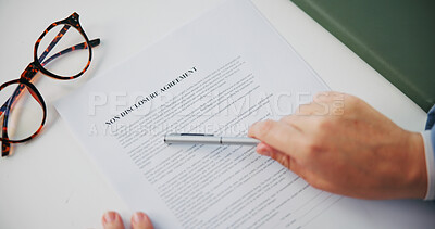 Buy stock photo Hands, document and non disclosure agreement at office with reading, review and legal compliance. Person, attorney and paperwork for privacy, secret and check information with contract from above