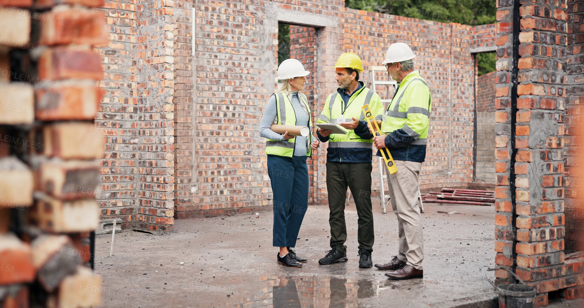 Buy stock photo Conversation, industry and construction team on site for building, maintenance or repairs. Meeting, planning and group of civil engineers with contractor for renovation or property development.