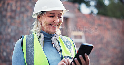 Buy stock photo Phone, mature woman and construction worker on site with contact for renovation approval. Contractor, cellphone and female civil engineer reading building, maintenance or repairs brief online.