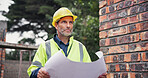 Thinking, man and architect at site with blueprint for inspection, floor plan and expansion safety. Mature person,  and document for compliance check, information and project management of renovation