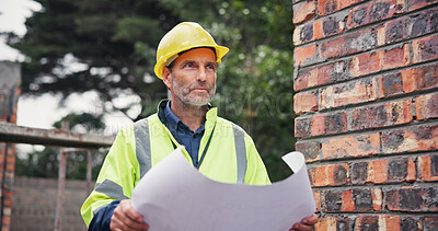 Buy stock photo Thinking, man and architect at site with blueprint for inspection, floor plan and expansion safety. Mature person,  and document for compliance check, information and project management of renovation