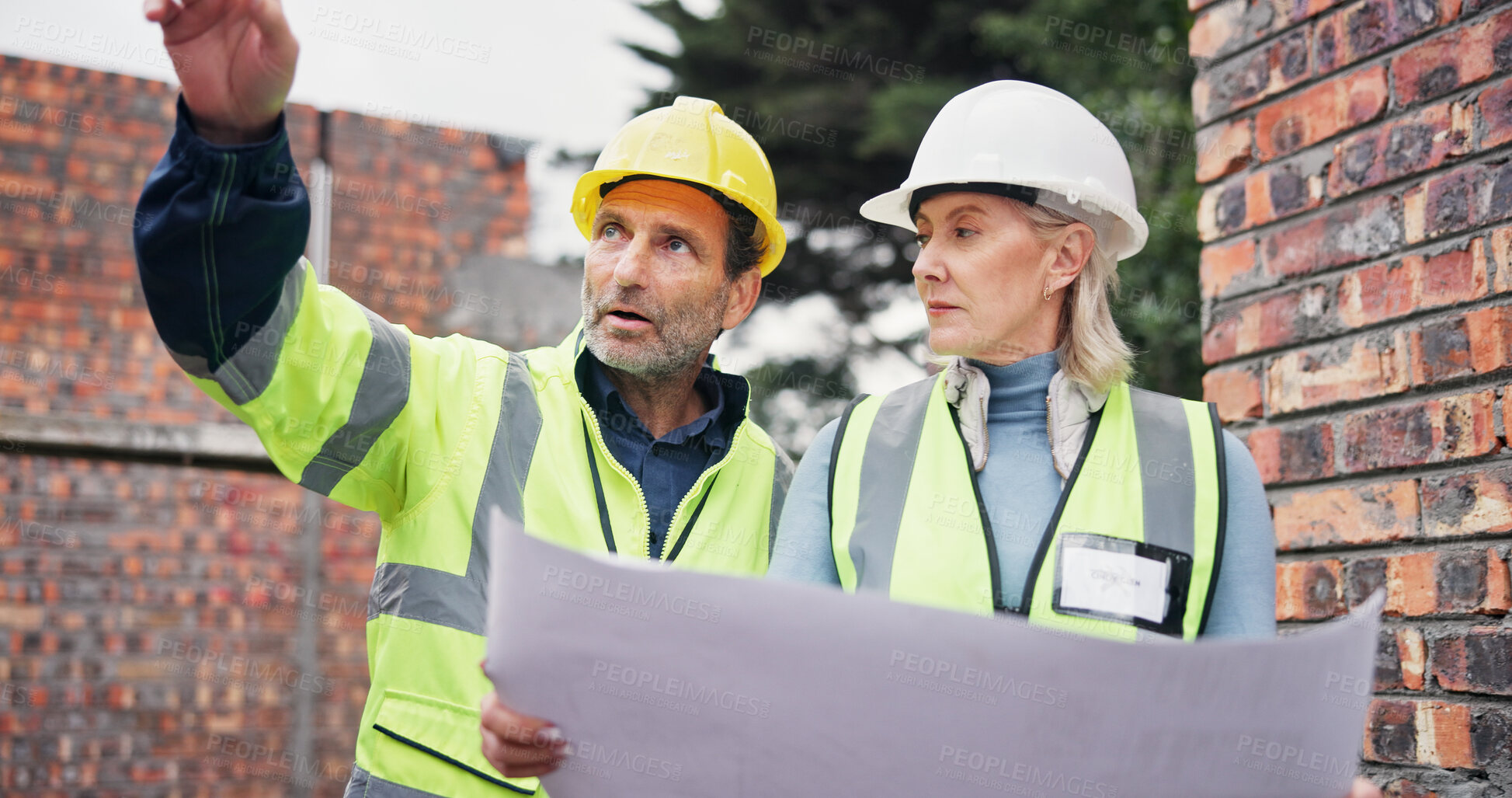 Buy stock photo Blueprint, meeting and construction team on site planning for building, maintenance or repairs. Discussion, architecture and civil engineers in collaboration for renovation or industrial project.