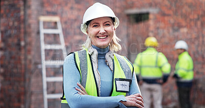 Buy stock photo Crossed arms, woman and portrait of construction worker on site with confidence for property development. Pride, happy and mature civil engineer at building for maintenance, repairs or renovation.