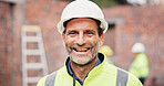 Happy, mature man and portrait of construction worker on site with confidence for property development. Pride, industry and male civil engineer at building for maintenance, repairs or renovation.