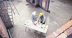 Above, meeting and people on construction site for floor plan, inspection or collaboration at table. Engineer, discussion and contractor with blueprint, brainstorming or architect design in morning