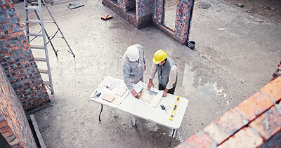 Buy stock photo Above, meeting and people on construction site for blueprint, inspection or collaboration at table. Engineer, discussion and contractor with floor plan, brainstorming or architect design in morning