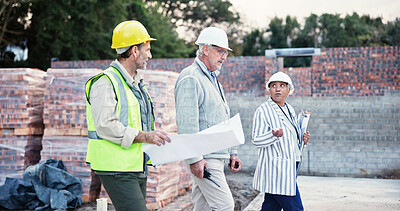 Buy stock photo Business people, engineer or walking with blueprint at site for construction planning or development. Group, employees or contractors with floor layout or documents for industrial building or project