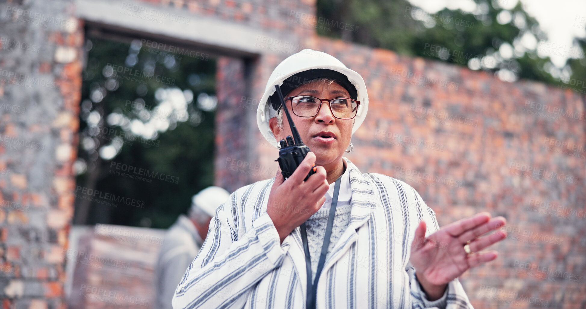 Buy stock photo Woman, architect and talk on radio for construction inspection, safety feedback and property development. Mature person, tech and planning with discussion, building update and chat for infrastructure