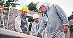 Construction site, people and discussion for floor plan, blueprint and idea for property development. Team, technology and contractor on worksite for project management, engineer and architect design