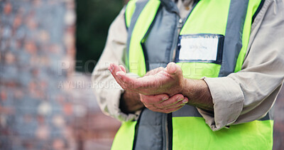 Buy stock photo Hands, person and wrist pain with construction injury, work site accident or sprain with agony outdoor. Joint ache, contractor with muscle tension or carpal tunnel, inflammation or fibromyalgia 