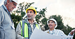 People, contractor and group with blueprint at construction site for floor plan, discussion and building development. Architect, documents and talk, inspection and teamwork for industrial project