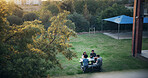 Above, outdoor and students with university, relax and bonding together with education. People, college and friends with lunch break, brainstorming and discussion with creativity and top view