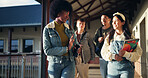 Friends, talking and students with walking in hallway for high school gossip, conversation and learning break. Education, people and happy with discussion outdoor for study tips and scholarship chat
