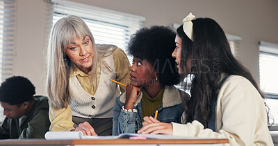 Buy stock photo School, college and teacher with students help for assessment, assignment and explain test question. University, academy and educator with girls for learning, teaching and education in classroom