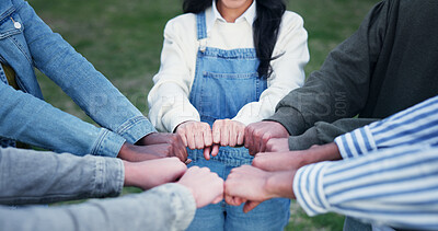 Buy stock photo Hands, huddle and solidarity with group of people for strength, support or unity from above. Circle, fist and trust with friends together for community, mission or team building for education