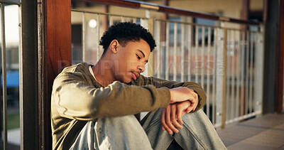 Buy stock photo Student, boy and thinking with depression, sad and pressure for test, confused and fatigue. Brain fog, outdoor or person on ground, anxiety or bored with education, burnout or doubt for future