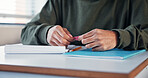 Student, hands and cheating with note in exam for test information, secret answer and knowledge fraud. School, person and assessment plagiarism in classroom with quiz corruption, liar and deception
