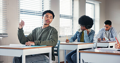 Buy stock photo Education, student and cheating with test in classroom for exam confusion, copy answer and scholarship risk. High school, boy and assessment fraud with plagiarism, secret peeking and quiz corruption