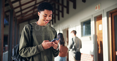 Buy stock photo Phone, education and smile with boy at school for University application, news and communication app. College admissions, learning portal and future with student on campus for mobile and scholarship