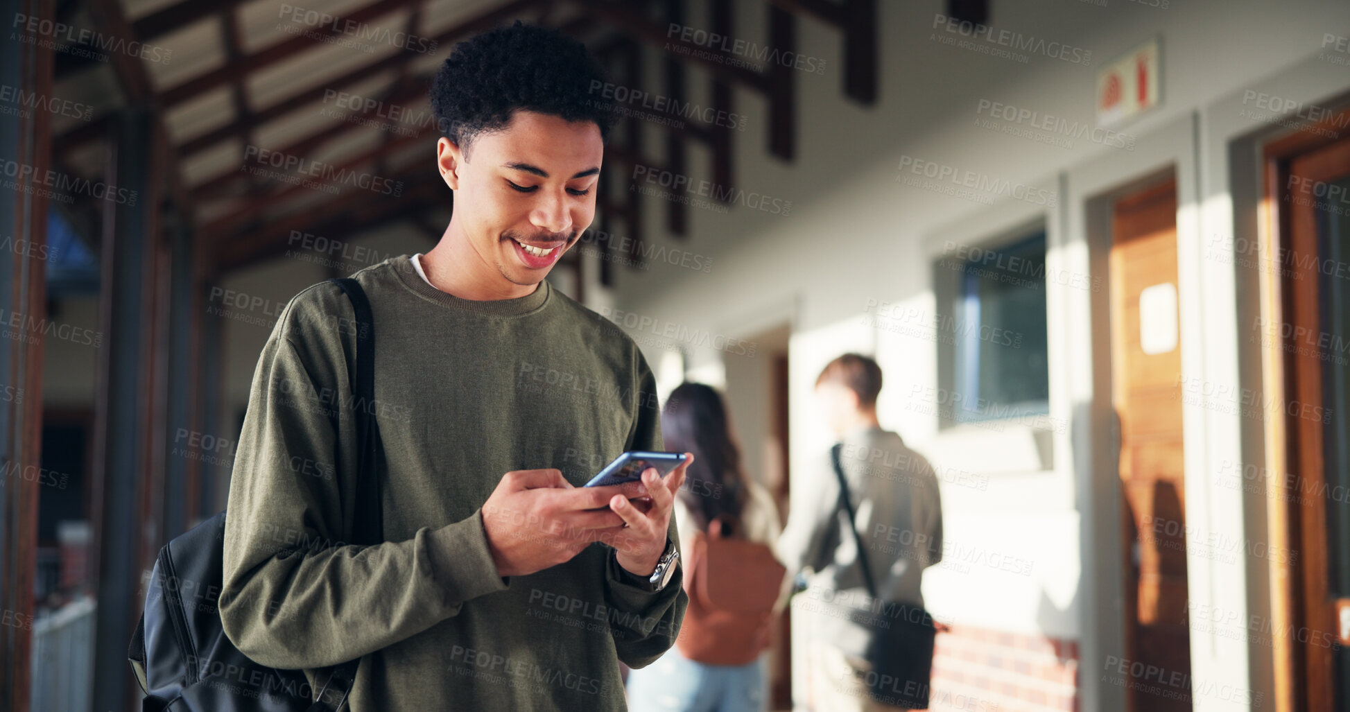 Buy stock photo Phone, education and smile with boy at school for University application, news and communication app. College admissions, learning portal and future with student on campus for mobile and scholarship