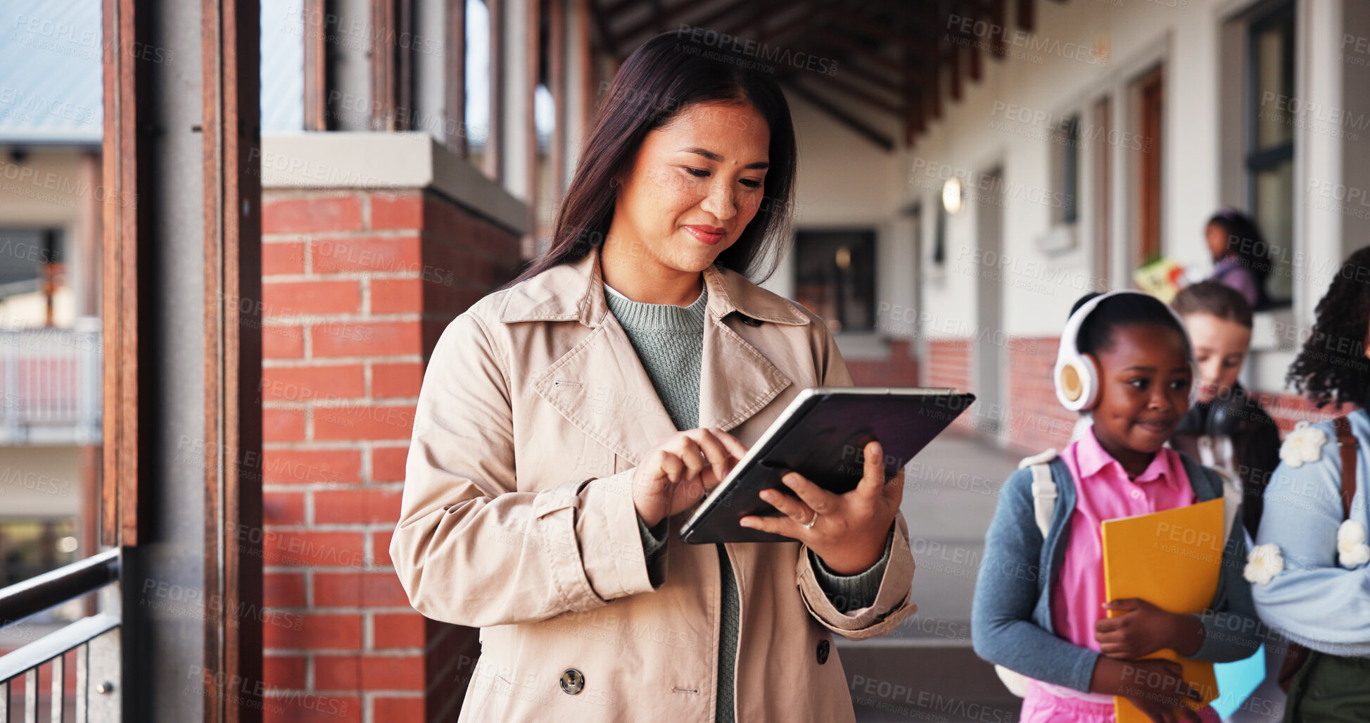 Buy stock photo Education, woman and teacher with tablet, school and lesson planning on website, browsing and smile. Happy, educator and person with tech for curriculum, scroll and knowledge for children or hallway