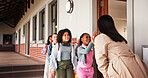 Teacher, children and happy with high five at classroom, queue and motivation for learning at school. Person, kids and mentor with welcome, smile and support with greeting in morning at academy