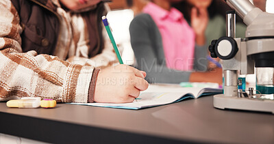 Buy stock photo Science, hands and child with writing in classroom for microscopic experiment, biology education and notes. School lab, student and book for scientific research, studying and learning for assessment