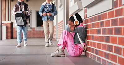 Buy stock photo Sad, cry and anxiety with student in school as child with autism, sensory overload and depression. Stress, mental health and girl dear with learning disability or bullying and education pressure 