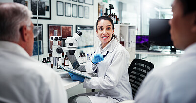 Buy stock photo Research, group and woman with tablet, science and meeting for experiment results. People, feedback and scientists in lab, tech and app for vaccine development, test review and healthcare with ideas