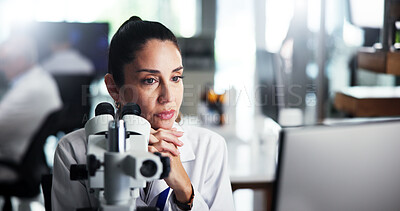 Buy stock photo Computer, scientist and thinking with woman with microscope for healthcare, medical research or test results. Tech, analysis or study with biologist in clinical trial for pharmaceutical development
