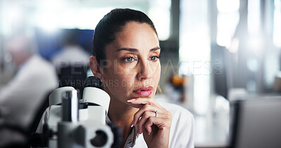 Buy stock photo Computer, scientist and study with woman with microscope for healthcare, medical research or test results. Tech, analysis or thinking with biologist in clinical trial for pharmaceutical development