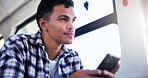 Phone, thinking and man on bus for travel with texting online, social media or mobile app. Daydreaming, cellphone and male passenger on public transportation with idea for commuting, trip or journey.