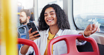 Buy stock photo Happy, girl and travel on bus with phone for social media scroll, morning commute and reading online news. Passenger, woman and smile with smartphone on public transport for streaming service or ride