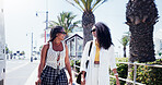 Walking, friends and women in street, conversation and bonding together with laughing. Happy people, outdoor and travelling for shopping trip, reunion and funny with joke, urban journey and humor
